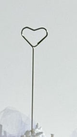 Gold wire heart card holder on a fine stem