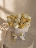 Rosebud Reverie wax flower bouquet of closed rosebuds in a round box